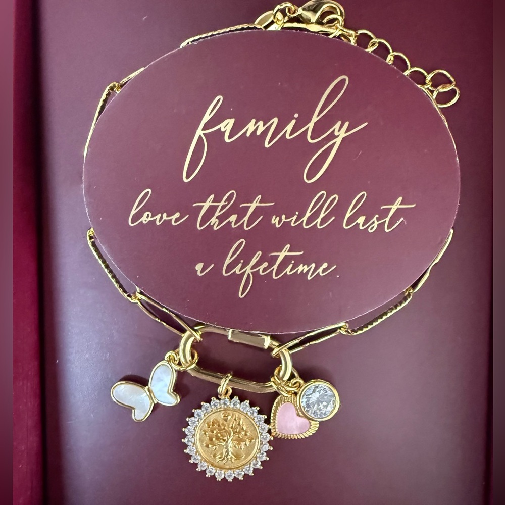 Milla 14kt gold plated charm bracelet butterfly, a tree of life & heart charm.